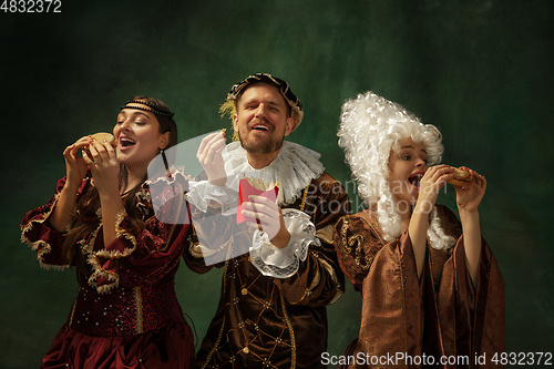 Image of Medieval young man and women in old-fashioned costume