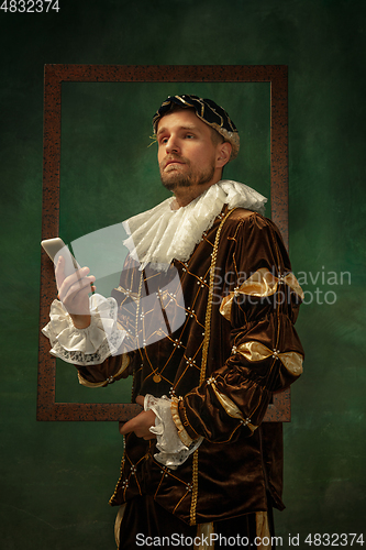 Image of Medieval young man in old-fashioned costume