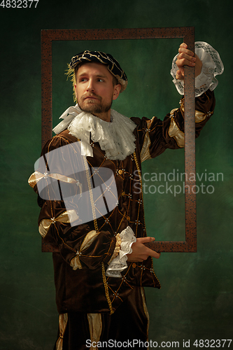 Image of Medieval young man in old-fashioned costume