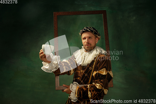 Image of Medieval young man in old-fashioned costume