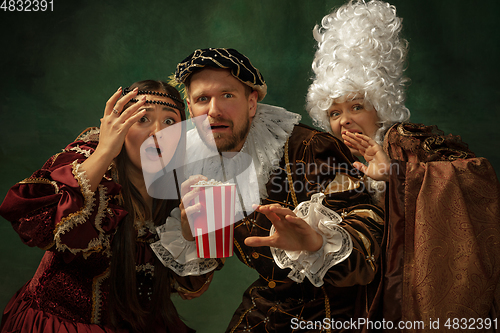 Image of Medieval young man and women in old-fashioned costume