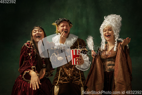 Image of Medieval young man and women in old-fashioned costume