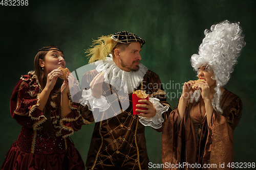 Image of Medieval young man and women in old-fashioned costume