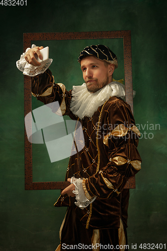 Image of Medieval young man in old-fashioned costume