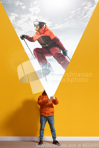 Image of Young caucasian man with smartphone, opening world using his gadget