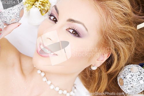 Image of lovely woman with christmas balls