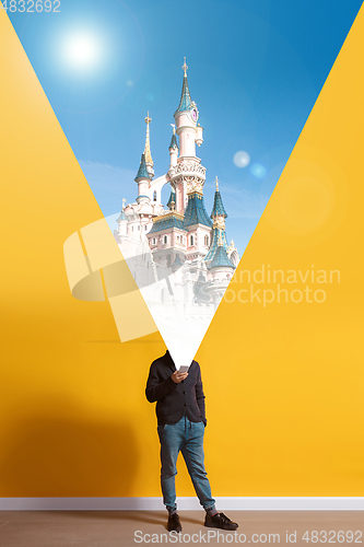 Image of Young caucasian man with smartphone, opening world using his gadget