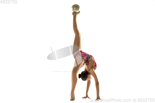 Image of Young flexible female gymnast isolated on white studio background
