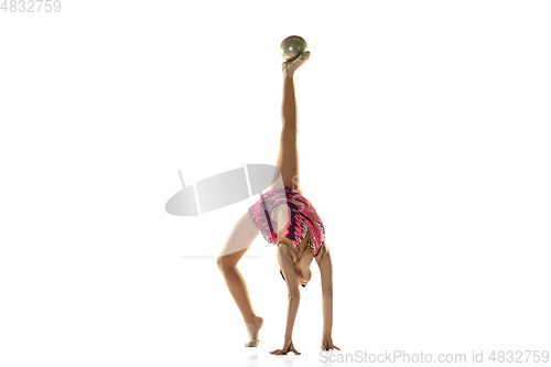 Image of Young flexible female gymnast isolated on white studio background