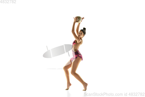 Image of Young flexible female gymnast isolated on white studio background