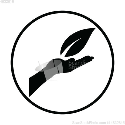 Image of Hand holding leaf icon