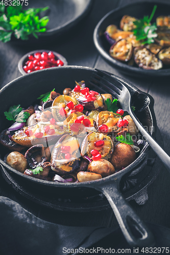 Image of Baked small eggplants, stuffed with mushrooms and pomegranate