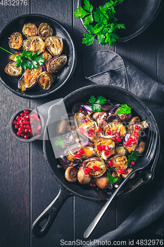 Image of Baked small eggplants, stuffed with mushrooms and pomegranate