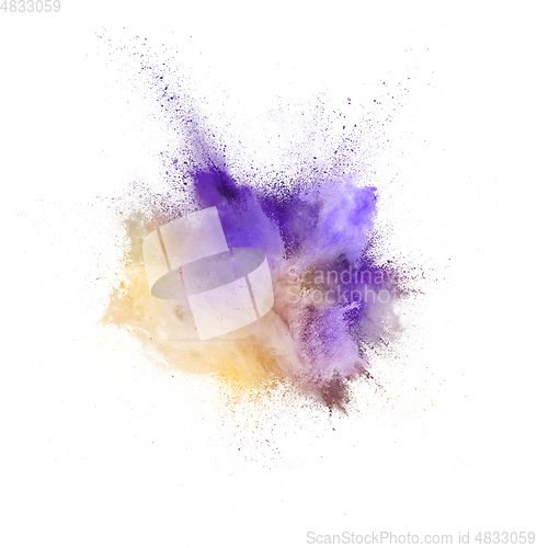 Image of Explosion of colored, fluid and neoned powder on white studio background with copyspace