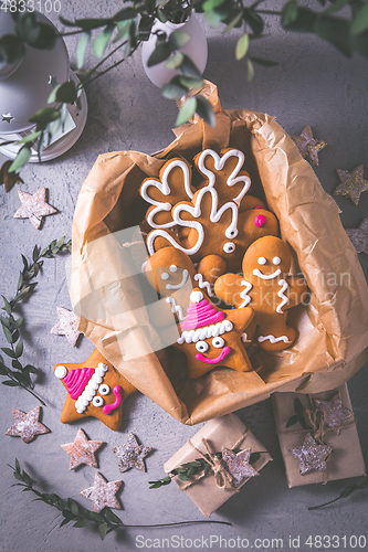 Image of Gingerbread cookies for Christmas in cookie box with stars