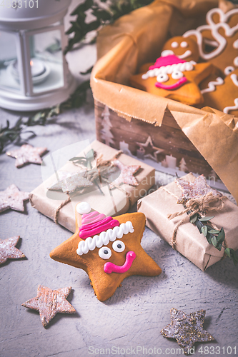 Image of Gingerbread cookies for Christmas in cookie box with stars