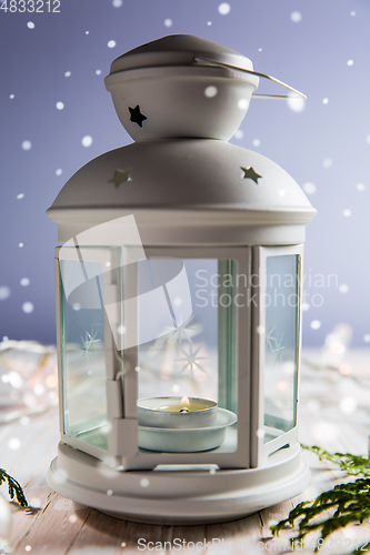 Image of Christmas lantern with snowflakes