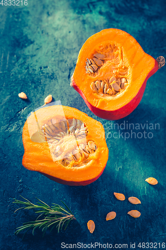 Image of Organic pumpkin with seeds ready for cooking