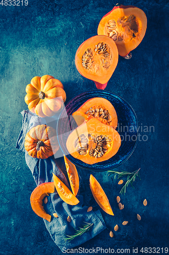 Image of Organic pumpkin with seeds ready for cooking