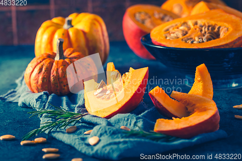 Image of Organic pumpkin with seeds ready for cooking