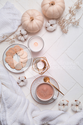 Image of Autumn and winter still life with hot chocolate and cocoa, cookies, candles