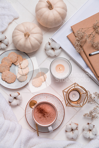 Image of Autumn and winter still life with hot chocolate and cocoa, cookies, candles