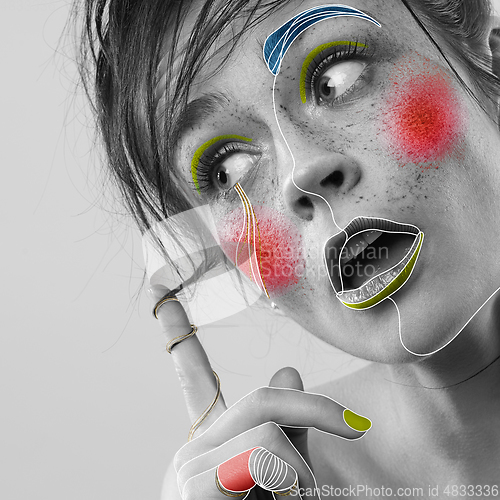 Image of Young woman with fashionable look, stylish make-up and hairstyle, lines design