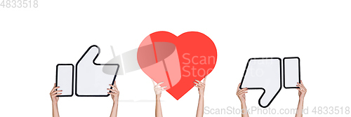 Image of Hands holding the signs of social media on white studio background, flyer