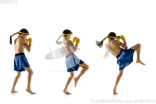 Image of Little boy exercising thai boxing on white background. Fighter practicing, training in martial arts in action, motion. Evolution of movement, catching moment.