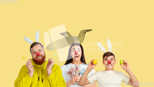 Image of Portrait of young people celebrating red nose day on yellow background