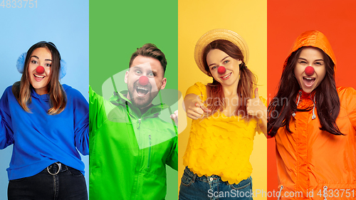 Image of Portrait of young people celebrating red nose day on colorful background