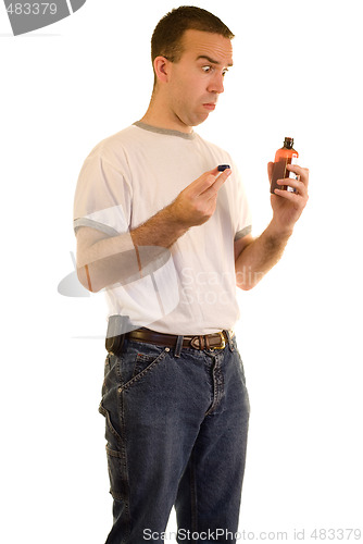 Image of Man Taking Medicine