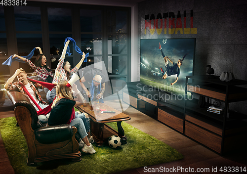 Image of Group of friends watching TV, football match with flag, sport games