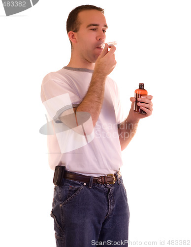 Image of Man Swallowing Medicine