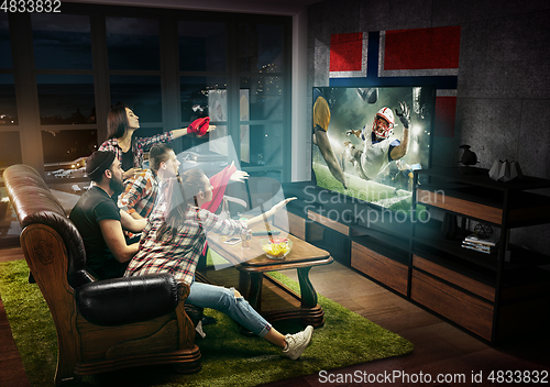 Image of Group of friends watching TV, american football match, sport games in Norway