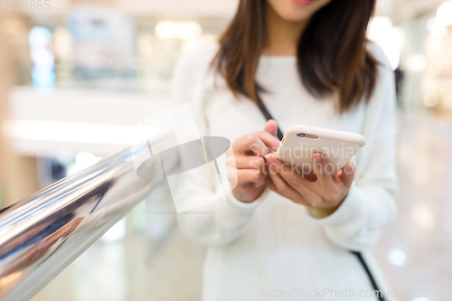 Image of Woman use of mobile phone