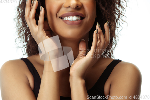 Image of Female face with well-kept skin isolated on white studio background