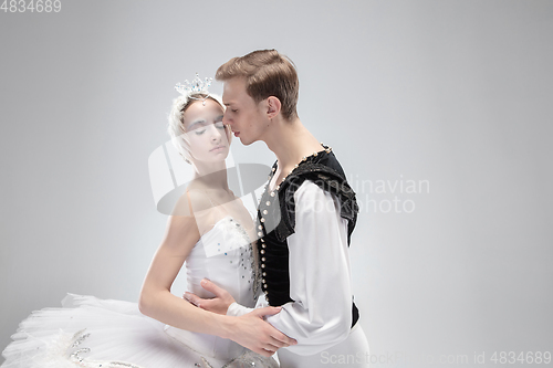 Image of Young graceful couple of ballet dancers on white studio background