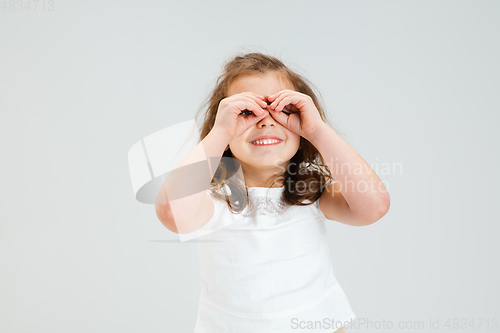 Image of Pretty caucasian girl portrait isolated on white studio background with copyspace