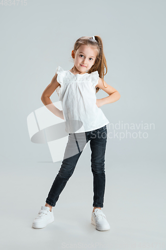 Image of Pretty caucasian girl portrait isolated on white studio background with copyspace