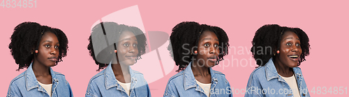 Image of African-american woman portrait isolated on pink studio background with copyspace