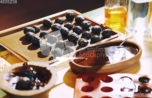 Image of Homemade organic vegetarian chocolates on a table