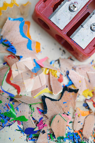 Image of Sharpener and colored pencil shavings