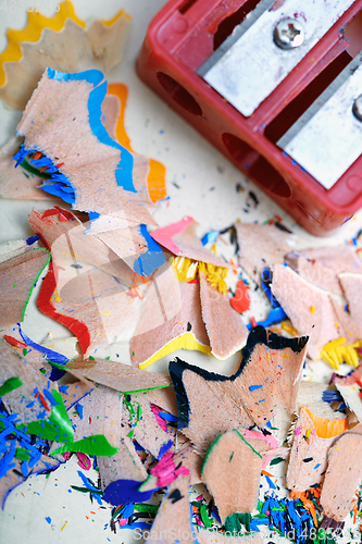 Image of Sharpener and colored pencil shavings