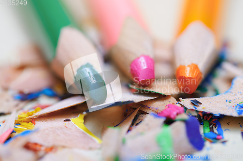 Image of Closeup on sharpened colored pencils with shavings