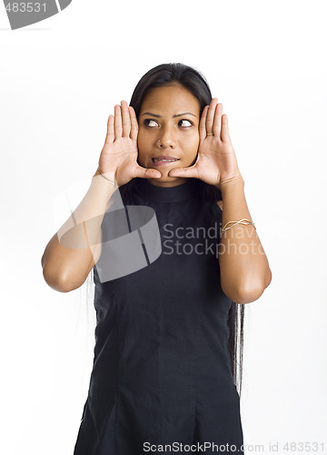 Image of young asian woman framed face