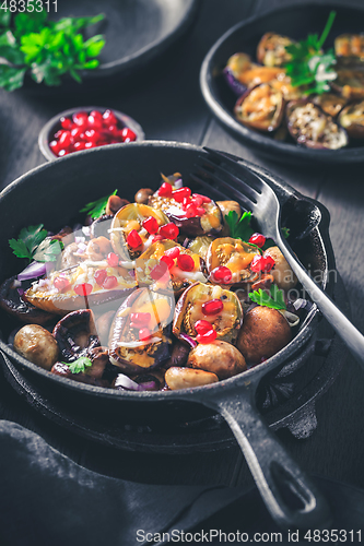 Image of Baked small eggplants, stuffed with mushrooms and pomegranate