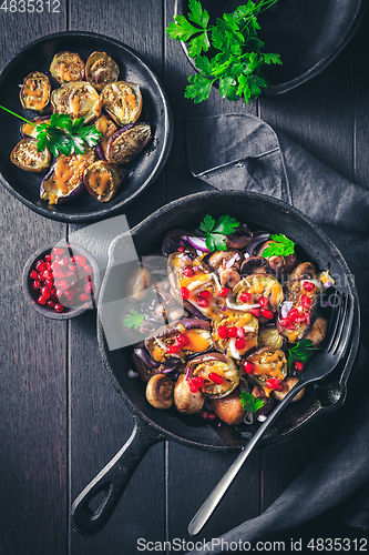 Image of Baked small eggplants, stuffed with mushrooms and pomegranate