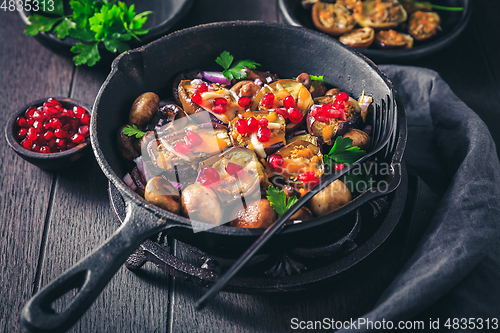 Image of Baked small eggplants, stuffed with mushrooms and pomegranate