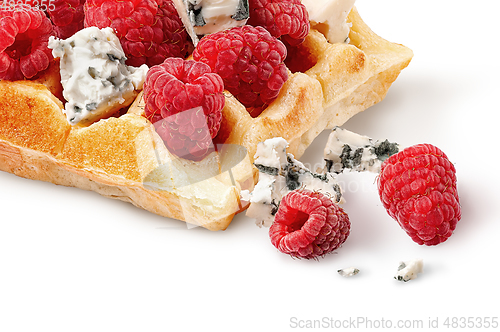 Image of Closeup french waffles with raspberries and dorblu